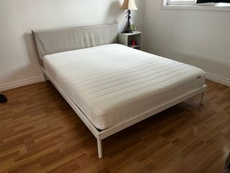 Queen size IKEA bed frame (**mattress not included**)