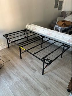 Twin Bed Frame + Mattress – Good Condition