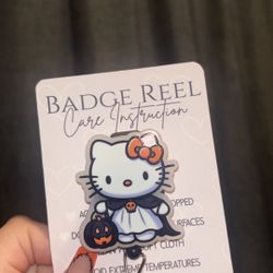 hello kitty badge reel