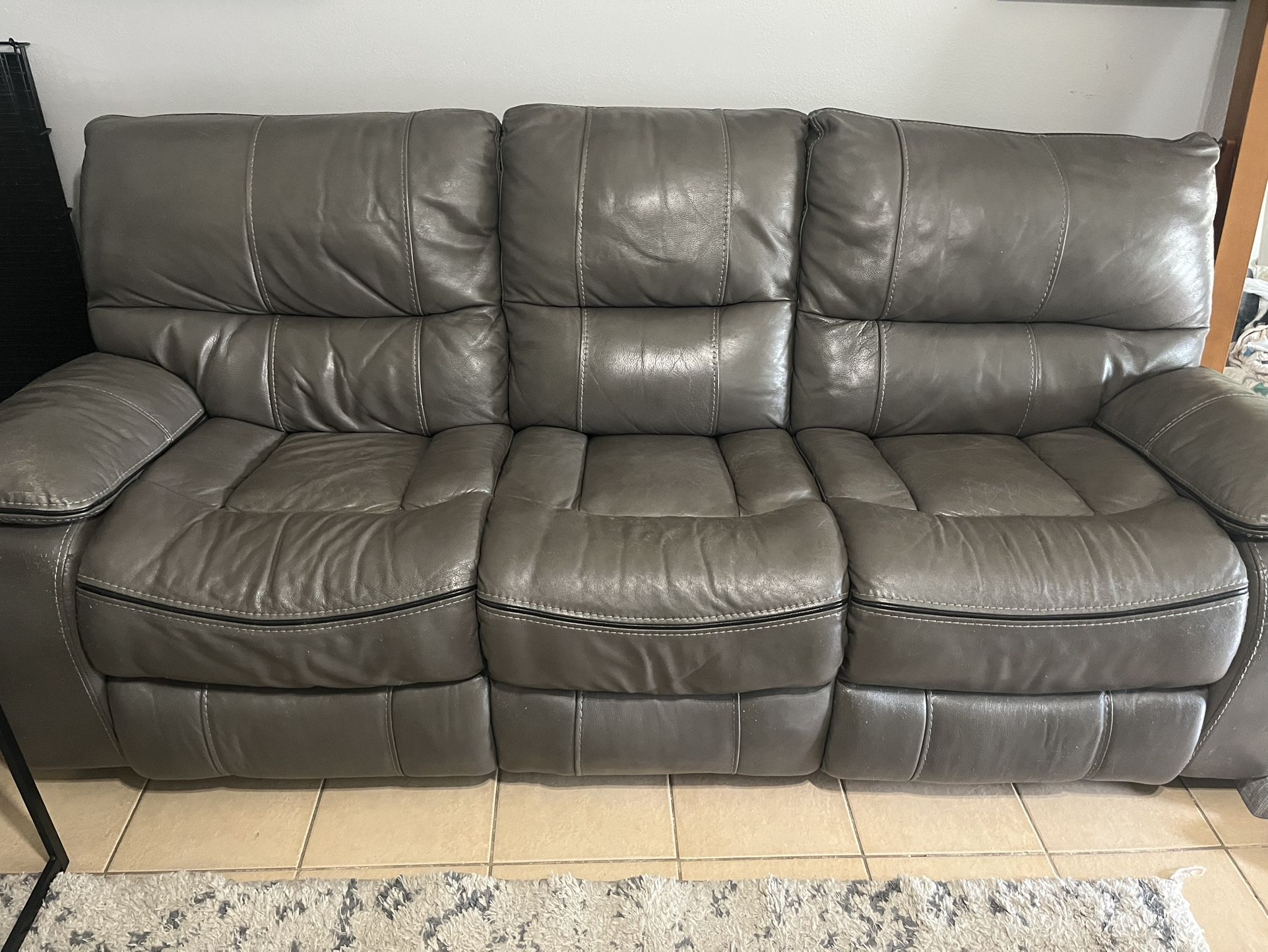 Cindy Crawford Home Gray Leather Reclining Sofa
