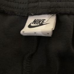 Black Nike tech sweats
