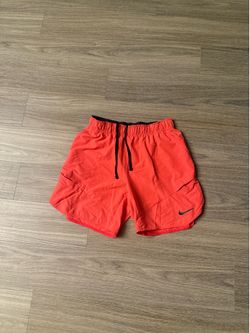 bright orange nike shorts/large