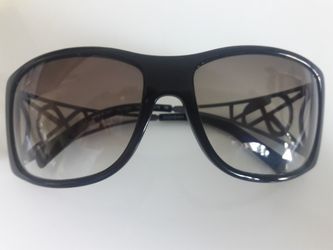 YSL.   Made in Italy.