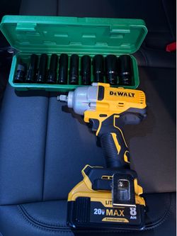 Dewalt 1/2 inch impact and the battery with the socket set included