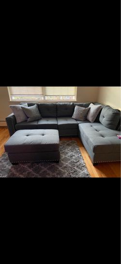Gray sectional w center piece for sale