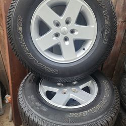 4 Jeep tires and wheels 17"