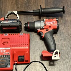Milwaukee M18 Fuel 18-V Lithium -Ion Brushless Cordless 1/2 in. Hammer Drill Driver Kit with 1 used  2.0  Ah Batteries And  New Charger   