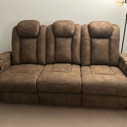 Ashley Wolfridge Dual Power Reclining Sofa