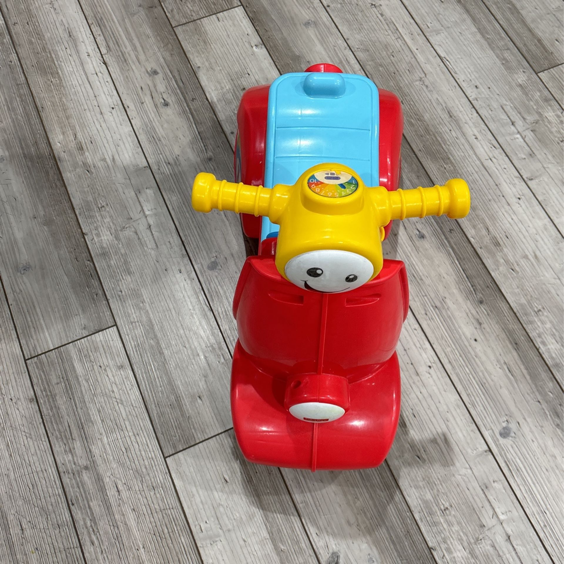 Fisher Price Scoot Along