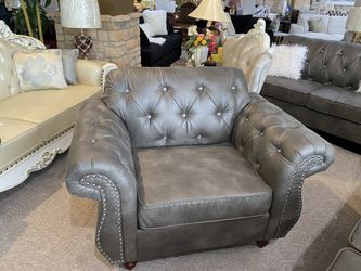 Gray chesterfield chair