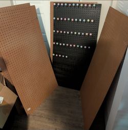 Brand new lots of peg boards with hanging hooks.  ( never used ).