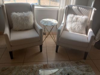 Set of two beige accent chairs