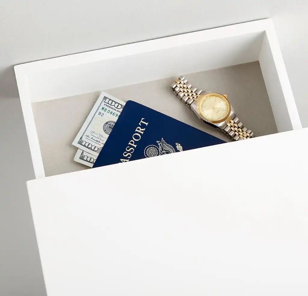 White floating hideaway storage shelf