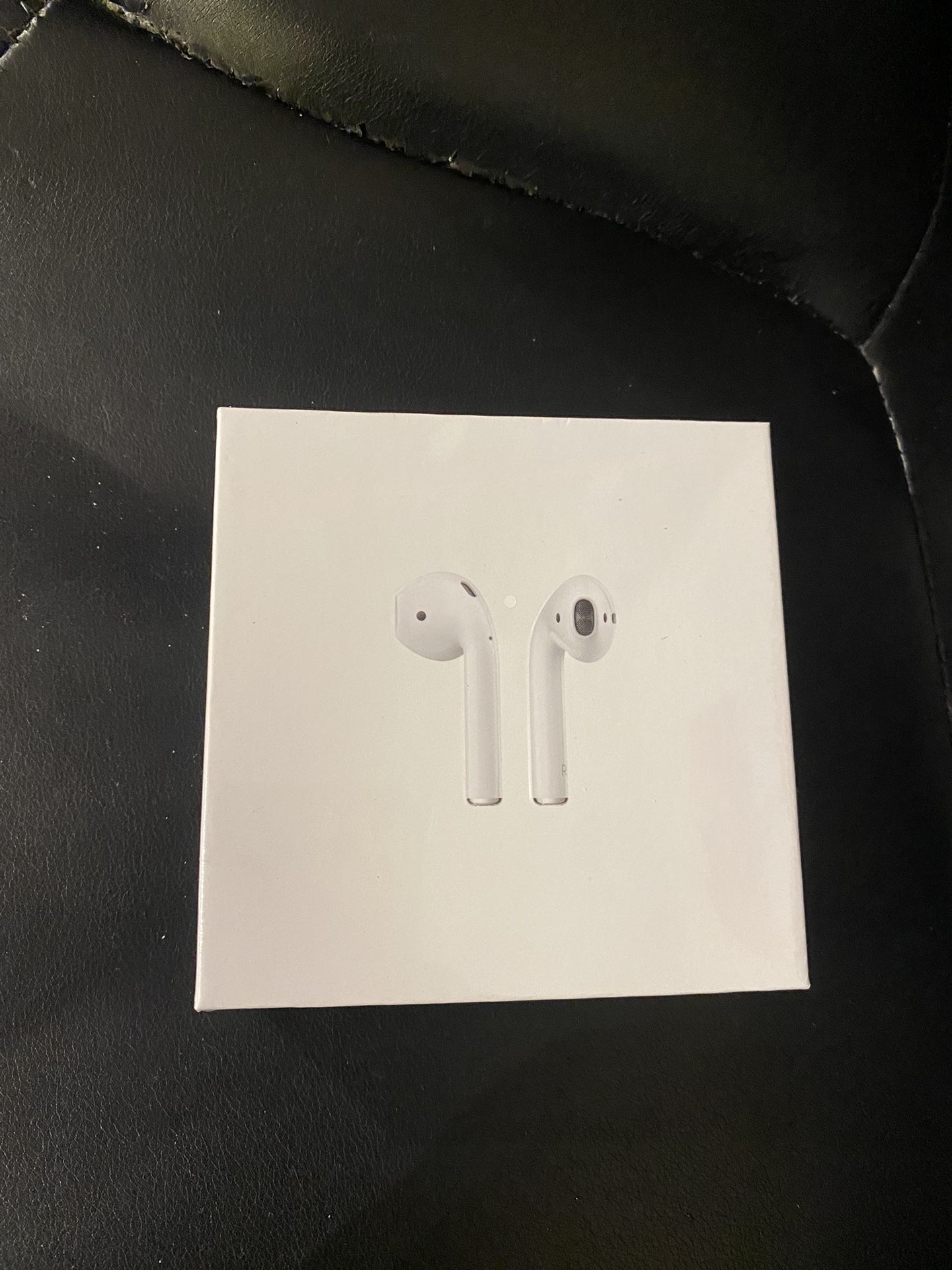 Apple AirPods (2nd Generation) Wireless Earbuds with Lightning Charging Case Included. Over 24 Hours of Battery Life, Effortless Setup. Bluetooth Head