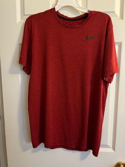Nike Dri-Fit red short-sleeve shirt, men’s medium