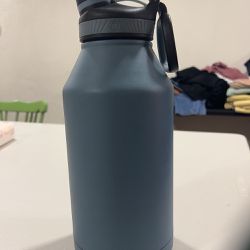 TAL 64 oz Water Bottle Steel Blue Lightly 