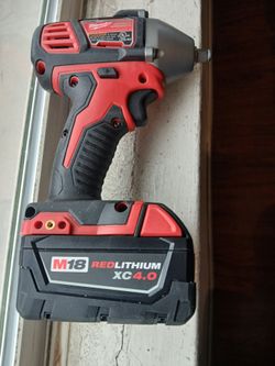 18v Milwaukee lmpact Wrench 3/8 lnch driver torque And Battery 4ah  new