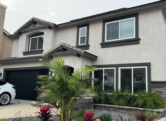 White windows and white doors, white and tan viny