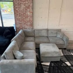 New Gray Sectional With Free Ottoman