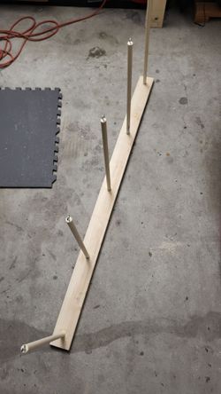 Surfboard vertical wall rack