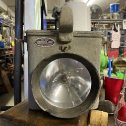 vintage industrial lamp, specifically a Carpenter-Light