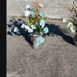 TWO LT BLUE AND WHÌTE ARTIFICIAL PLANTS AND VASE