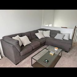 Grey Sectional And Coffee Table 