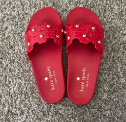 Kate spades New York red slides with gold charms