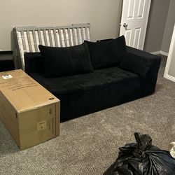 Cloud couch - one half open and one in a box