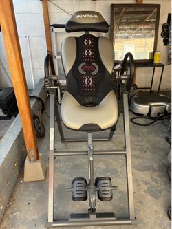 Inversion table spinal traction vibration