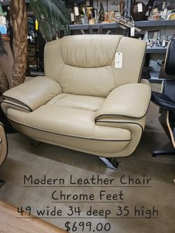 Chair Leather w/ Chrome feetWe are located at 2811 East Bell road. Another Time Around Furniture.