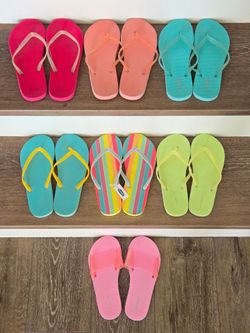 7 Pairs of Flip Flops (size 3/4 girls)