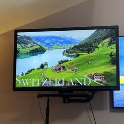 55” Emerson TV w/ wall mount