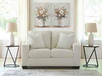 Amesley Ivory Loveseat