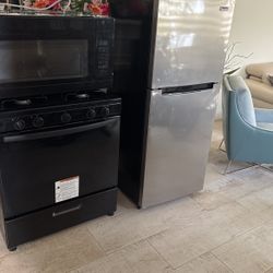 Microwave, stove and refrigerator