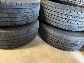 Chevy rims 4 Yokohama Geolandar H/T G056 Tires w/ OEM Chevy Rims – 75% Tread