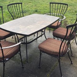 Outdoor Cast-Iron Dining Table With Seats And Cushions 