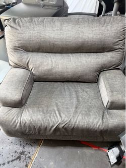 grey clogrety cloth rrecliner with ottoman