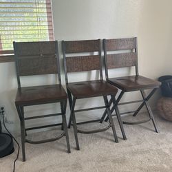 Set Of 4 Wooden Chairs From Ashley furniture 