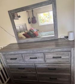 Grey 7 drawer dresser with Mirror