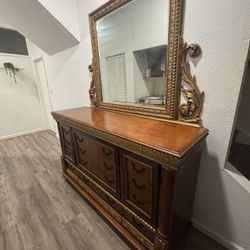 Italian vintage Pulaski Dresser with mirror  Birch wood with mahogany finish and gold leaf details .