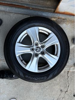 Two Geo Drive wheel and tires