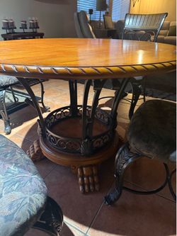 48 inch round wood table. Top includes four chairs.