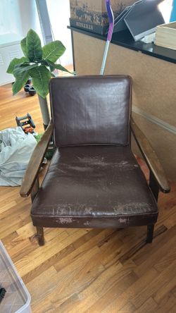 Vintage Mid-Century Modern (MCM) lounge chair, with strong Danish Modern influences.