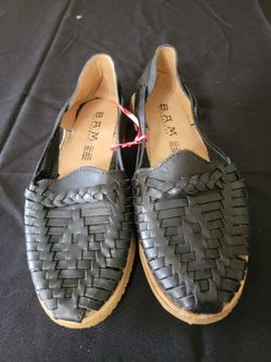 black, handwoven leather huarache sandals