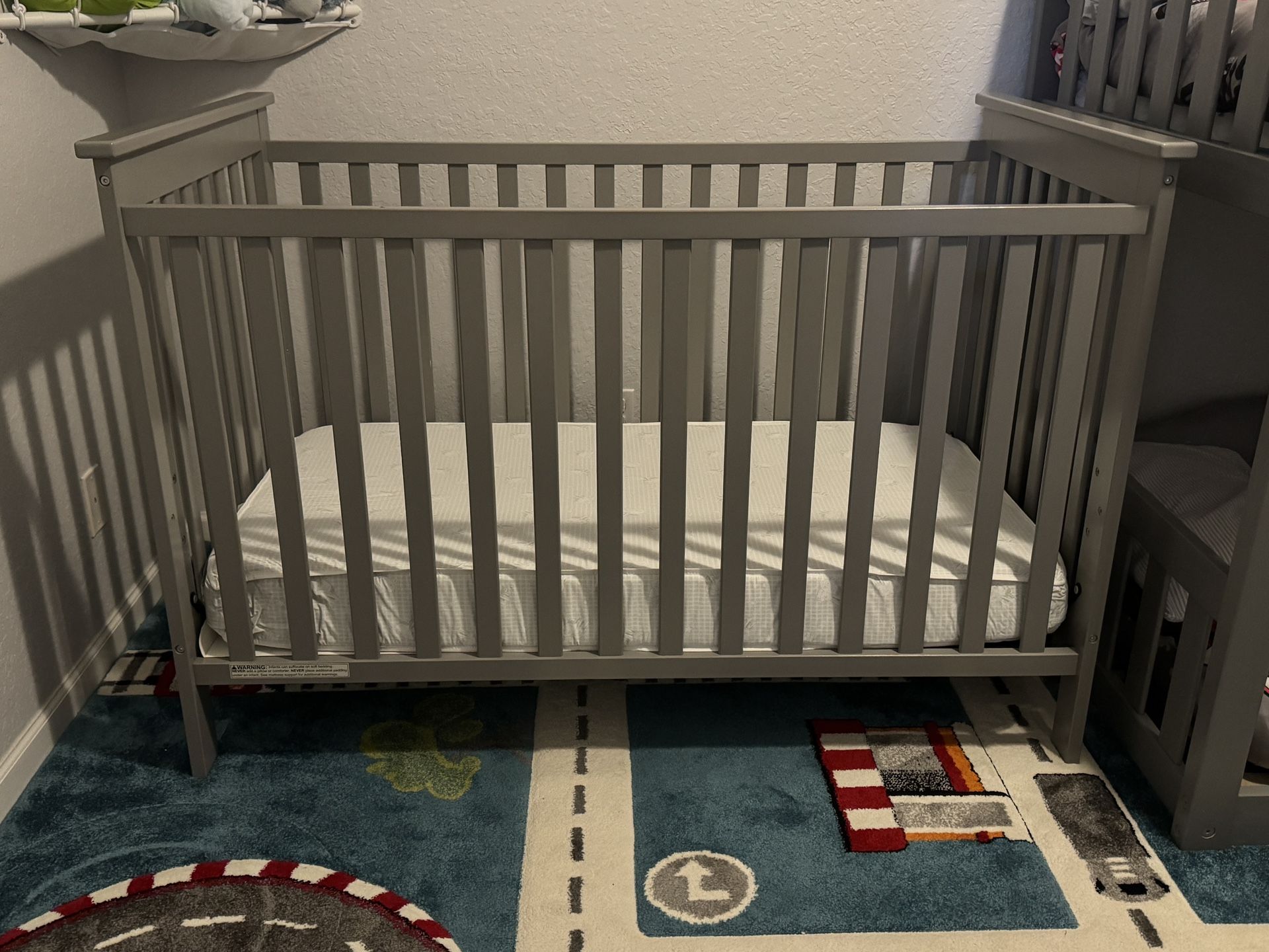 Gray Delta Children 3 in 1 crib