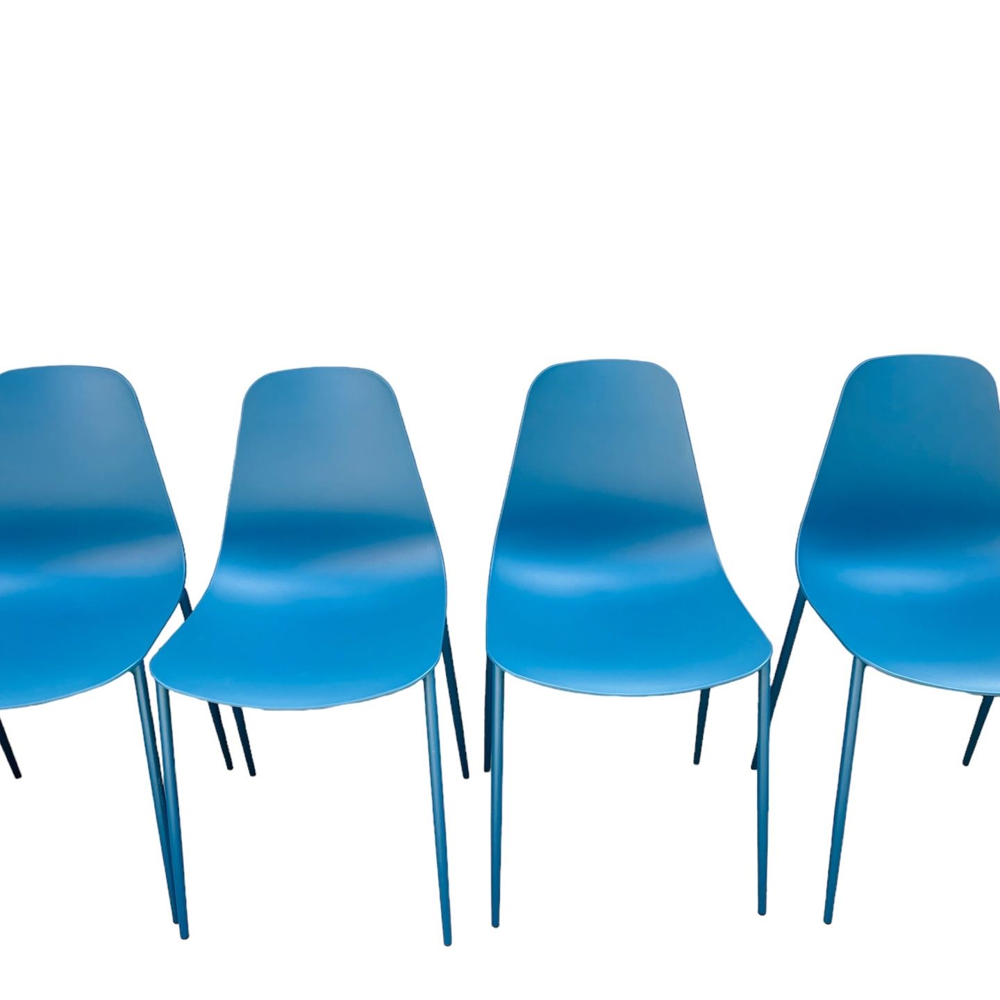 4 blue molded plastic chairs