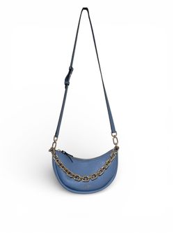 Small, light blue bag by Kate Spade New York.