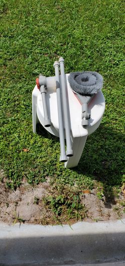 Vintage washing brush that attaches to any hose.  Hose included.