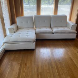 White Leather Couch With Black Trim

